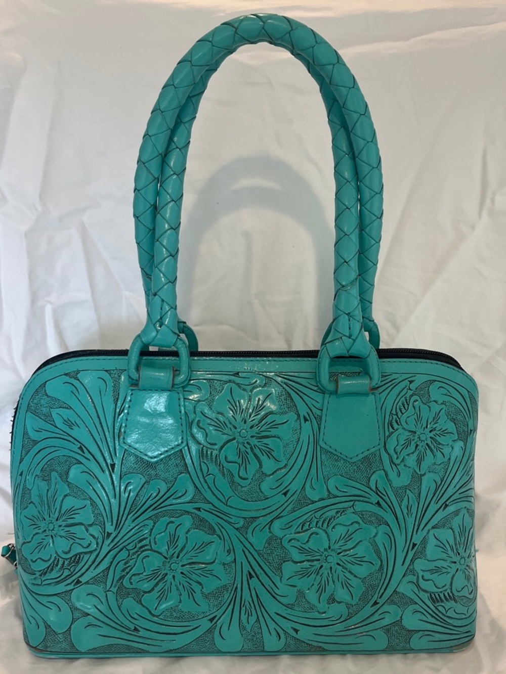 Que Chula handmade turquoise leather handbag